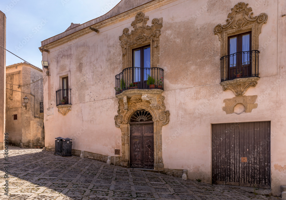 Fototapeta premium Erice, Sicily, Italy - July 10, 2020: Sicilian souvenirs. Ancient, typical narrow and cobblestone street in Erice, Sicily, Italy