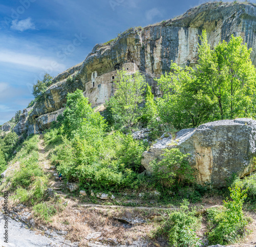 The panorama of the Hermitage of San Bartolomeo in Legio built with stones and carved into the rock