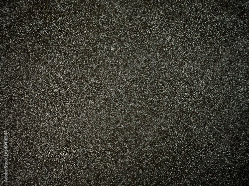 Black glitter texture abstract background