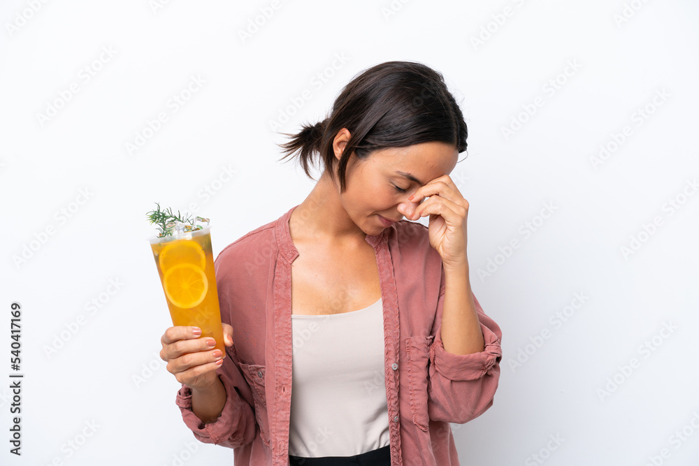 Young hispanic woman holding a cocktail isolated on white background laughing Young hispanic woman holding a cocktail isolated on white background laughing