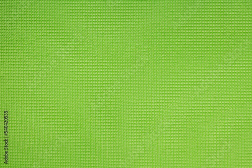 Bright green embossed background with waffle texture