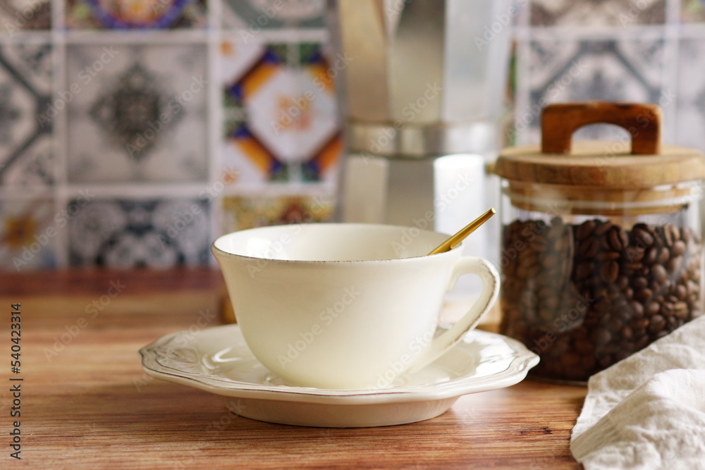 Coffee cup mockup and kitchen utensils table Portuguese and Spain Azulejo tile background,trendy Eco style home still life. Space for text or menu . Business food brand template. Coffee cup mockup and kitchen utensils table Portuguese and Spain Azulejo tile background,trendy Eco style home still life. Space for text or menu . Business food brand template.