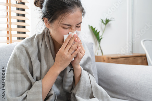 young woman coughing and flu at home