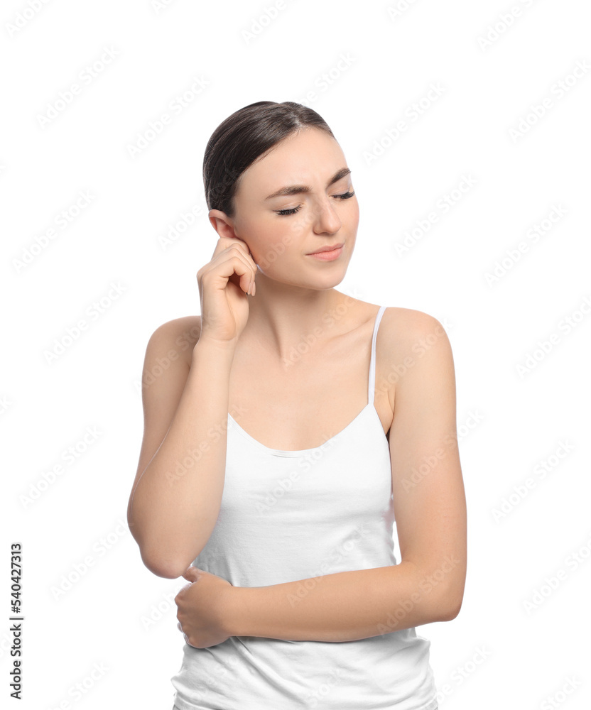 Young woman suffering from ear pain on white background Young woman suffering from ear pain on white background