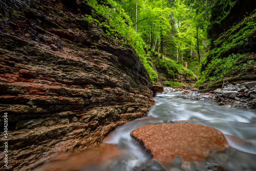 Long Exposure of Creek in Taugl River Gorge near Salzburg, Austria, Europe photo