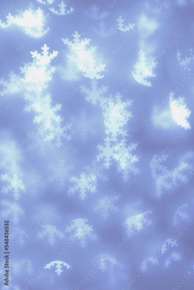 Bokeh as lights white snowflakes on blue background, abstract winter holiday wallpaper with optical blurred pattern. Christmas or New Year abstract image as backdrop, aesthetic blur Bokeh as lights white snowflakes on blue background, abstract winter holiday wallpaper with optical blurred pattern. Christmas or New Year abstract image as backdrop, aesthetic blur