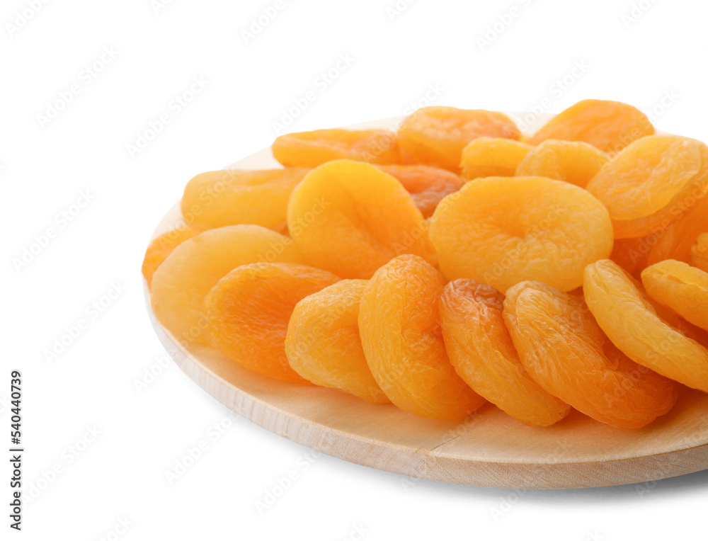 Wooden tray with tasty dried apricots isolated on white Wooden tray with tasty dried apricots isolated on white