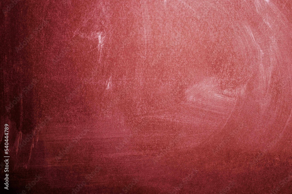 Fototapeta premium Chalk rubbed out on blackboard, red texture or background