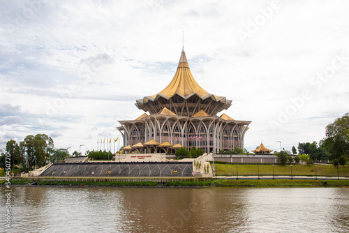 Kuching Malaysia Sep 3rd 2022  the view of Sarawak river and New Sarawak State Legislative Assembly Building.  The cross-section of the building is designed like a nine-pointed star.
