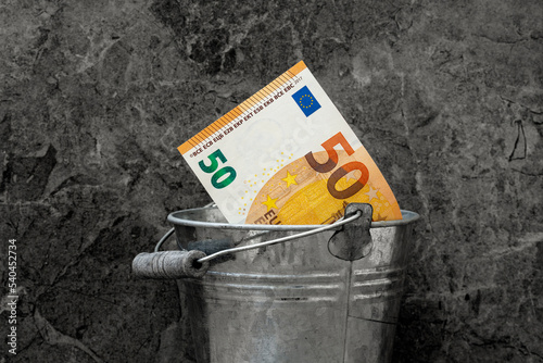 European Currency Fifty Euro Bill in a Silver pail or a metal Bucket