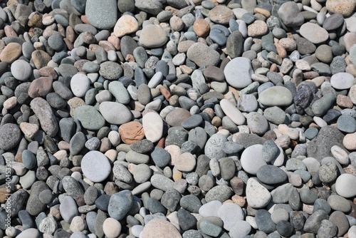 Many different stones as background, above view
