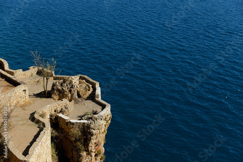 castle on the background of the sea of rich turquoise color. High quality photo