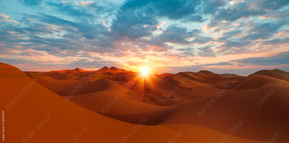 Sand dunes in the Sahara Desert, Merzouga, Morocco - Orange dunes in the desert of Morocco - Sahara desert, Morocco