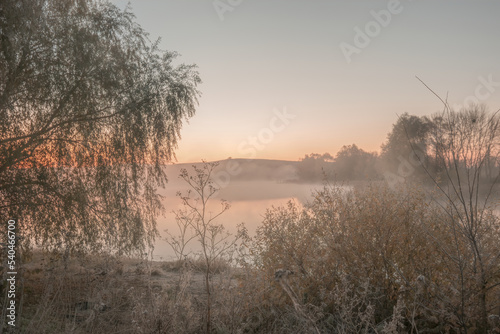 morning on misty foggy Autumn Fall lake