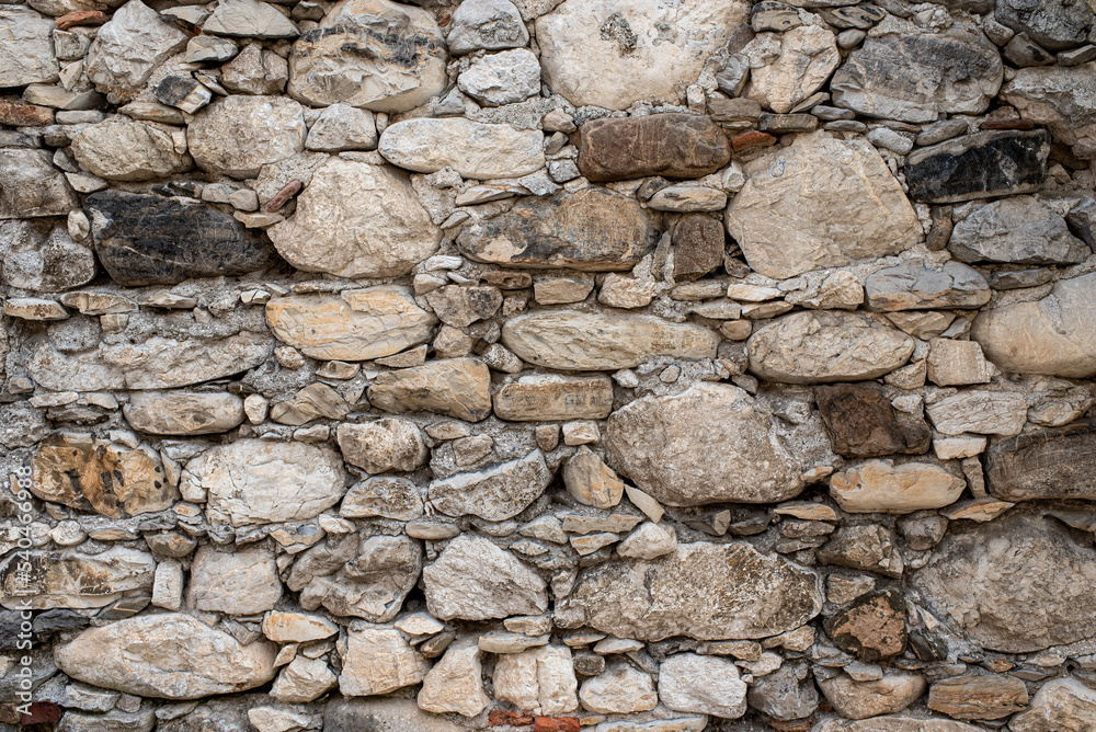 Gabion retaining wall made of concrete and stone in a mountainous terrain Gabion retaining wall made of concrete and stone in a mountainous terrain