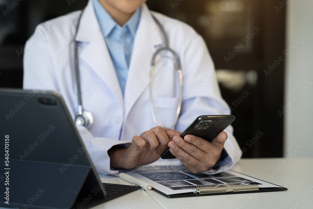 Doctor texting and sms with tablet texting patient. Doctor texting and sms with tablet texting patient.
