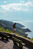 Young man in front of the aerial landscape view of San Sebastian, spain