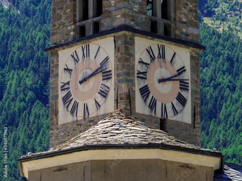 Clock Tower, Church of Saint Ursus, Cogne, Aosta Valley, Italy photo