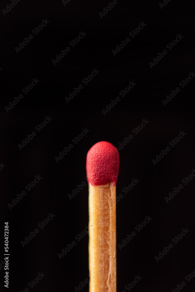 Matchstick in detail seen through a macro lens, black background, selective focus. Matchstick in detail seen through a macro lens, black background, selective focus.