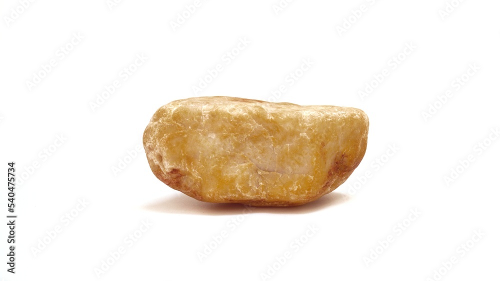 yellow marble on a white background yellow marble on a white background