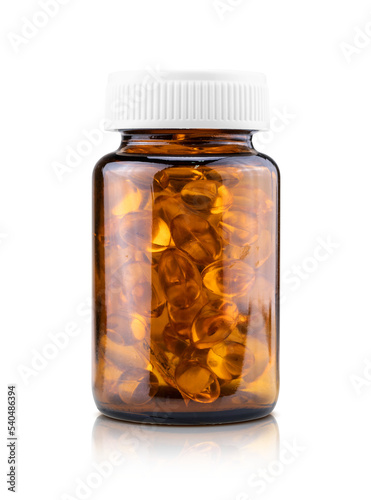 Fish oil dietary supplement capsules in brown glass bottle packaging for supplement product design mock-up