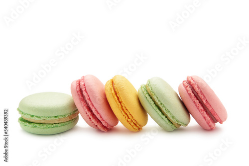 French colorful macarons isolated on background