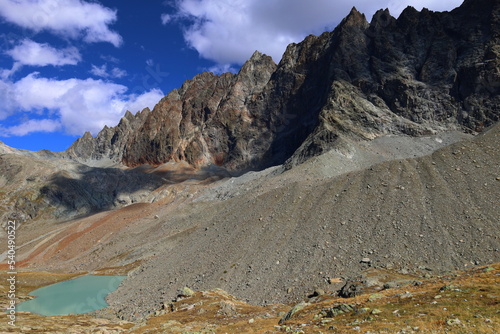 Mountain landscape of long distance hiking trail Tour Des Combins which crosses Switzerland to Italy via Bourg Saint Pierre, Fenetre Durand and Aosta Valley, TDC photo