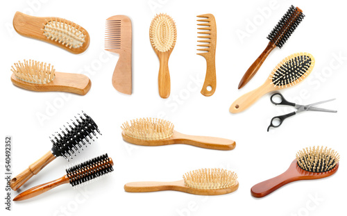 Set of different hair brushes and combs isolated on white