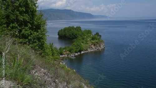 People ride saps on Lake Baikal