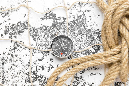 Compass, rope and fishnet o...