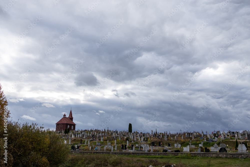 Landscape with wooden chapel and cemetery Landscape with wooden chapel and cemetery