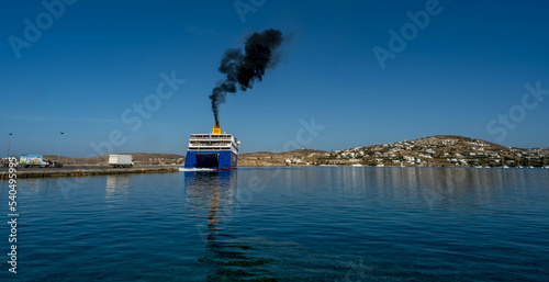 Plume of black smoke from a ferry boat at Paros island