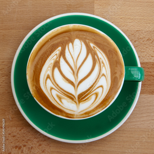 A cup of hot art latte, cappuccino 