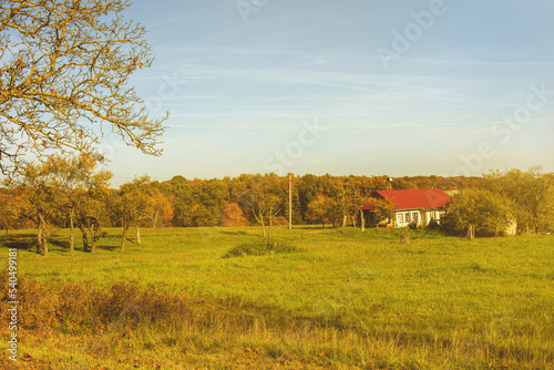 Peasant house in beautiful natural surroundings.Sunny autumn day.