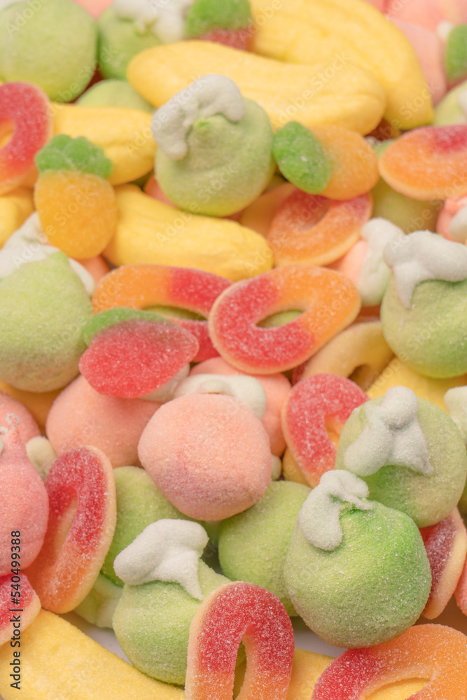 Mix of jelly candys and marshmallows as a background. Mix of jelly candys and marshmallows as a background.