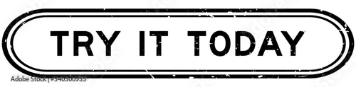 Grunge black try it today word rubber seal stamp on white background