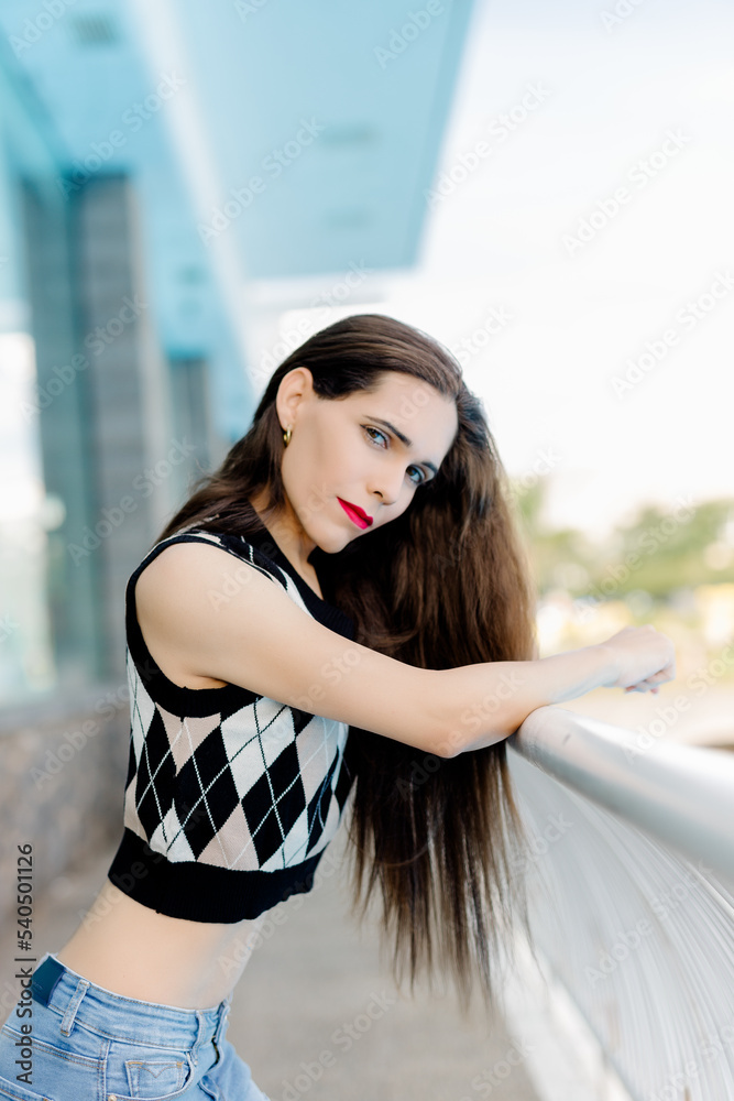 Confident young transgender woman looking at camera while posing