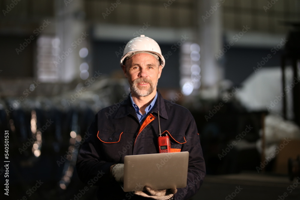 Man engineer standing on construction site or equipment maintenance work site. Man engineer standing on construction site or equipment maintenance work site.