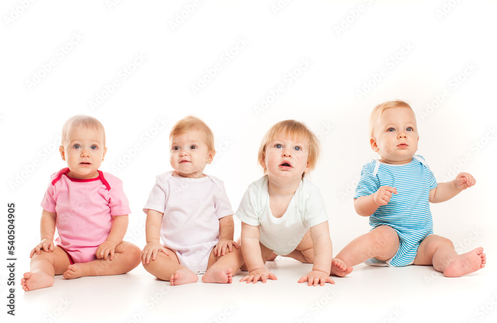Four babies isolated isolated on white background Four babies isolated isolated on white background