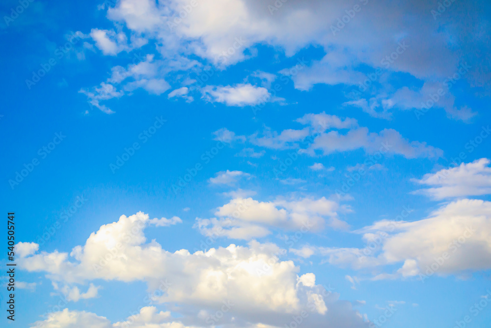 Beautiful clouds with blue sky background. Light sunlight and light clouds for creative graphic design