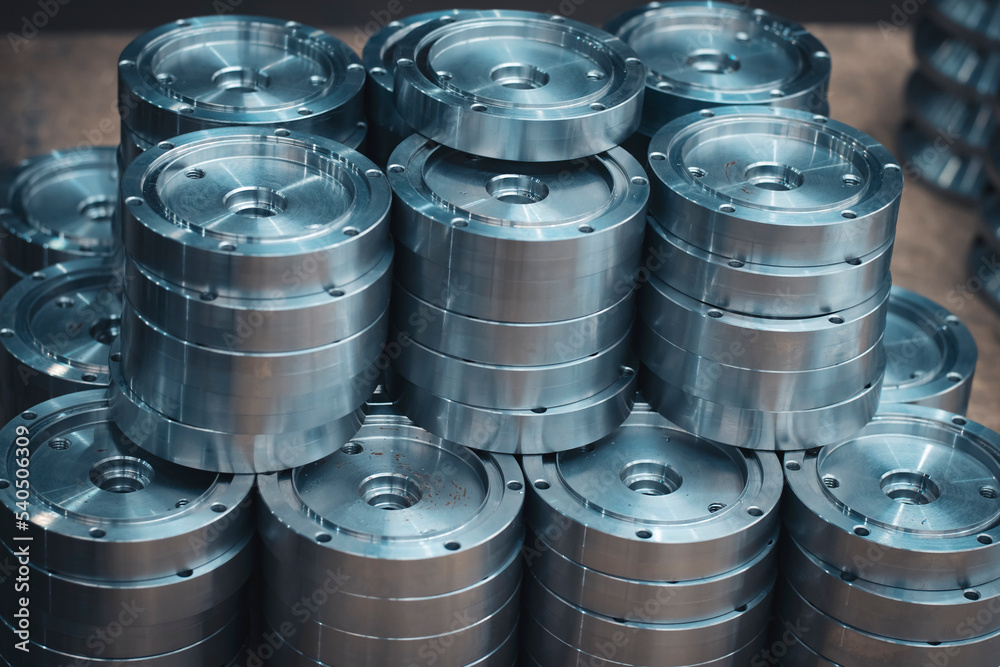 Steel products processed on a CNC lathe and milling machine, neatly folded and awaiting inspection by the Quality Control Department. Close-up Steel products processed on a CNC lathe and milling machine, neatly folded and awaiting inspection by the Quality Control Department. Close-up