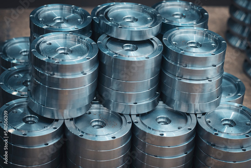 Steel products processed on a CNC lathe and milling machine, neatly folded and awaiting inspection by the Quality Control Department. Close-up