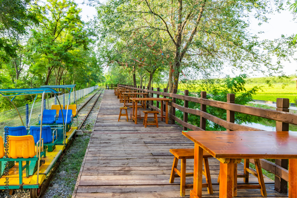 A pavilion and tables and chairs in the Xiqing Country Park in Tianjin A pavilion and tables and chairs in the Xiqing Country Park in Tianjin