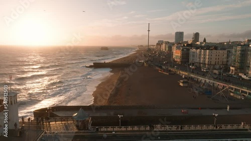 Beautiful Brighton beach 4k video. Magical sunset and stormy weather in Brighton, UK. Town by the ocean.