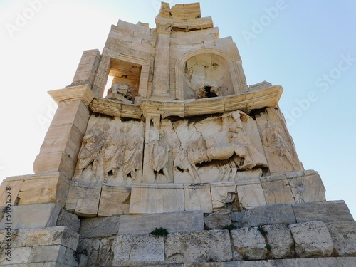 View of the Philopappos monument and its sculptures, on the homonymous hill, in Athens, Greece photo