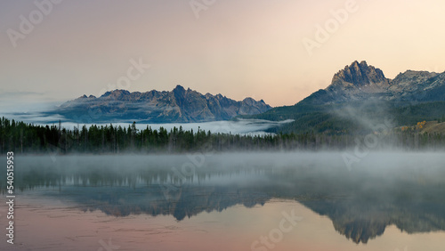 Sawtooth mountain in Idaho lake fog morning