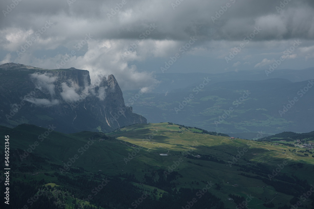 View to the Sciliar massif with the characteristic silhouette and Alpe di Siusi in Italy.