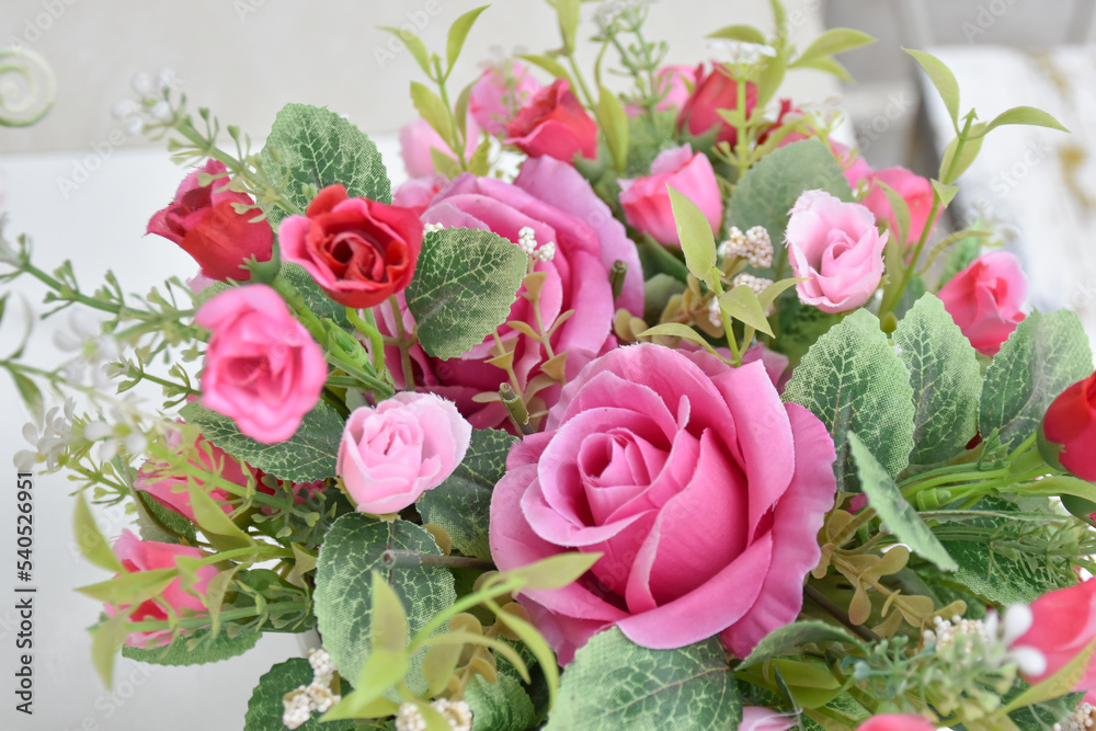 Flowers, roses, virtual reality, in a bushy pot, a variety of colors, available on the balcony. background is blur