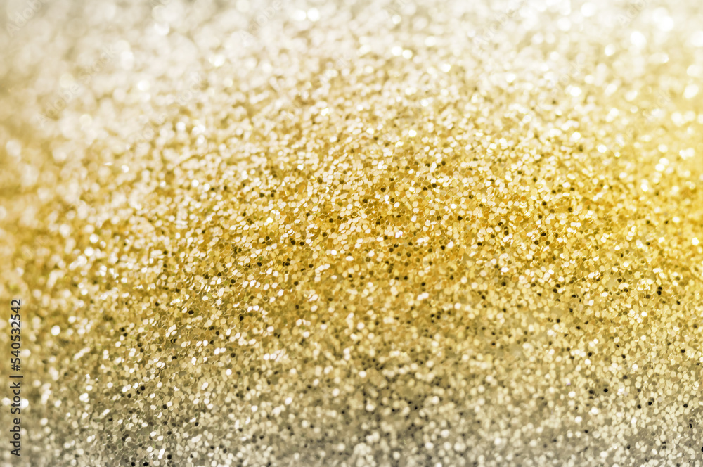 Gold Background. The background is orange. Yellow glittery background.