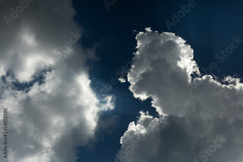 White clouds in summer. Clouds in blue sky. Weather details.